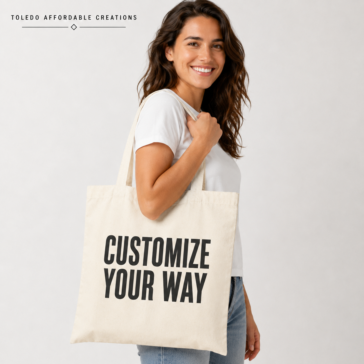 Adult model carrying a Customize Your Way tote bag